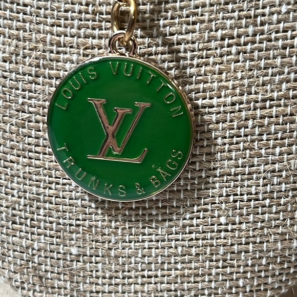 LV CHARM ON A 18k OVER STERLING SILVER CHAIN. - Picture 1 of 3
